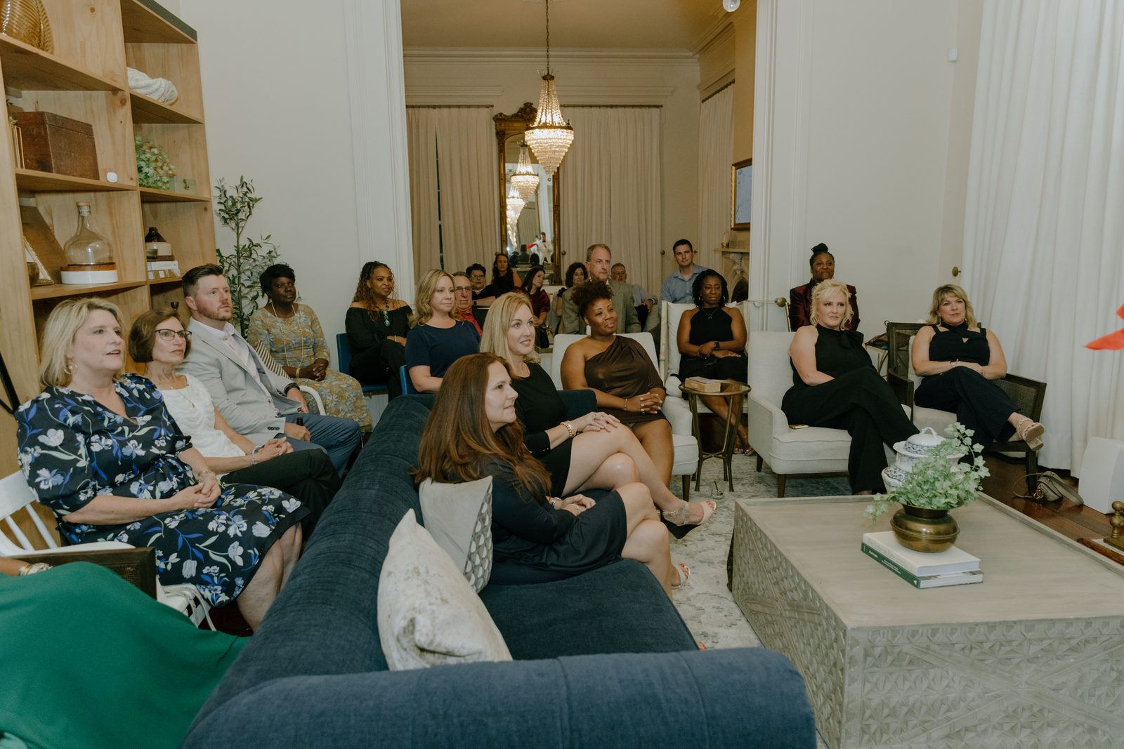 An audience leaning in together during the performance